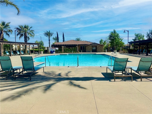 16759 Yellow Fern Ln, Fontana, CA 92336 - community pool with a patio area and a pergola