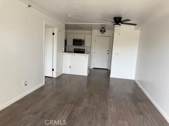 11410 Dolan Ave Unit 227, Downey, CA 90241 - unfurnished living room with ceiling fan, dark wood-style floors, baseboards, and ornamental molding