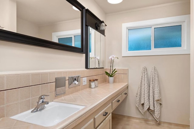 bathroom featuring backsplash and vanity
