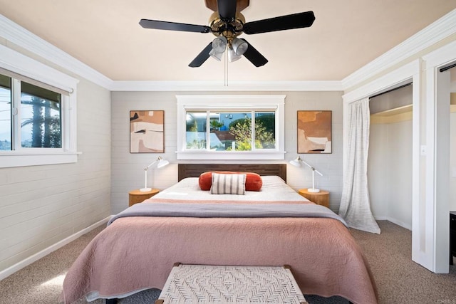 bedroom featuring multiple windows, carpet floors, crown molding, a ceiling fan, and baseboards