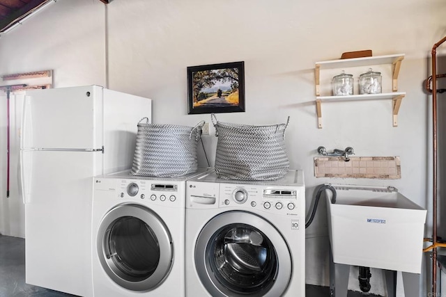 laundry area with separate washer and dryer