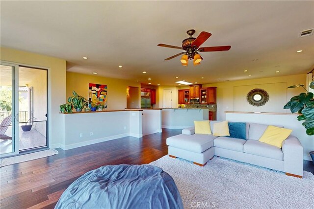 5595 Tanbark Ct, Avila Beach, CA 93424 - living area with dark wood-style floors, recessed lighting, ceiling fan, and baseboards