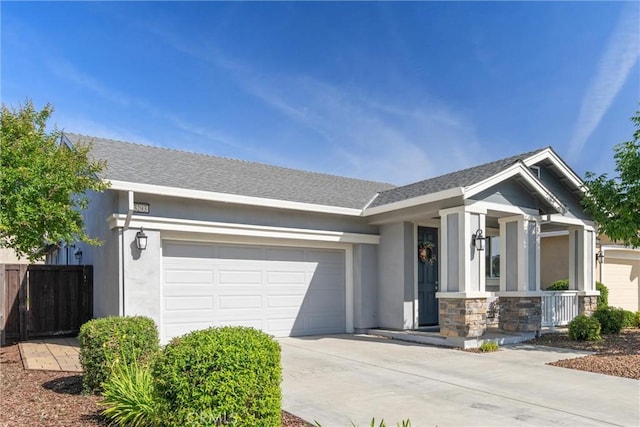 3293 Rogue River Dr, Chico, CA 95973 - ranch-style home with driveway, stucco siding, a garage, and fence
