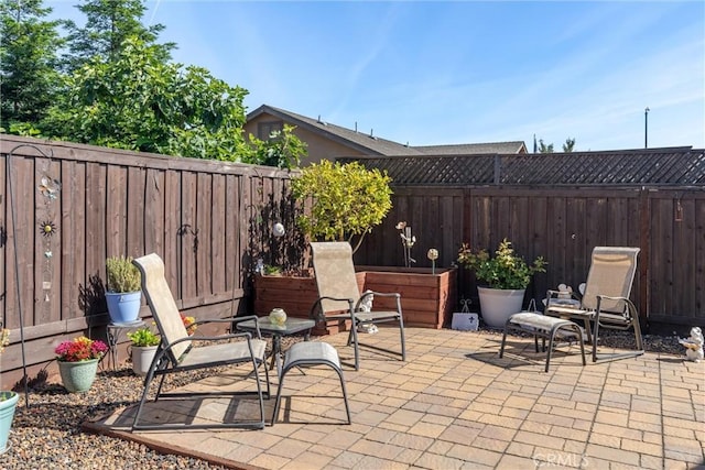 3293 Rogue River Dr, Chico, CA 95973 - view of patio with a fenced backyard