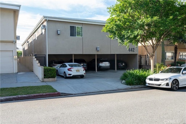 442 E Santa Anita Ave, Burbank, CA 91501 - view of front of house with stucco siding and covered parking