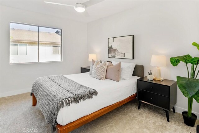 10353 Carefree Dr, Santee, CA 92071 - carpeted bedroom with baseboards and a ceiling fan