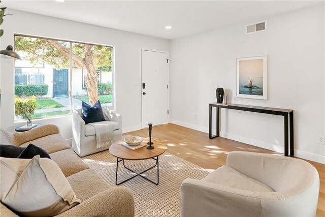 10353 Carefree Dr, Santee, CA 92071 - living area featuring recessed lighting, light wood-style floors, and baseboards