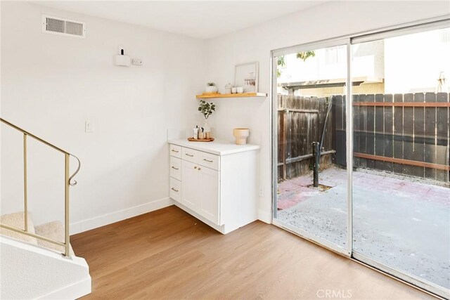 10353 Carefree Dr, Santee, CA 92071 - doorway to outside with light wood-type flooring and baseboards