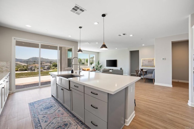 4650 Silent Knoll Dr, Fallbrook, CA 92028 - kitchen with gray cabinets, a sink, dishwasher, light countertops, and recessed lighting