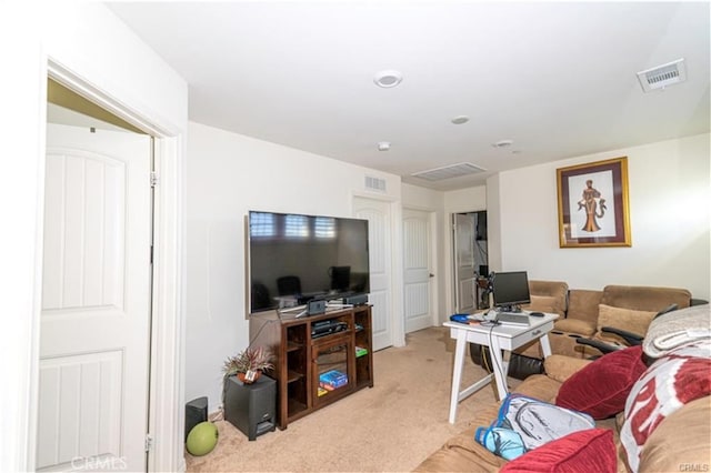 15590 Pumpkin Pl, Fontana, CA 92336 - living room with light colored carpet and an office area