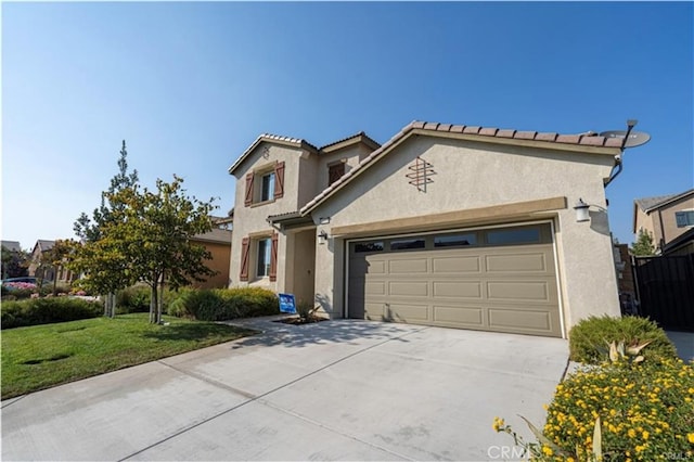 15590 Pumpkin Pl, Fontana, CA 92336 - traditional-style house with an attached garage, stucco siding, and driveway