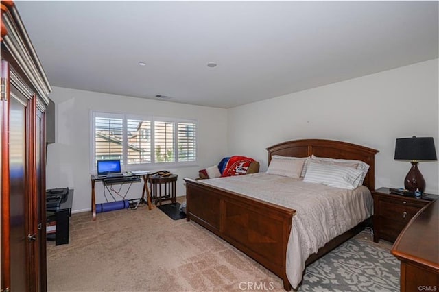 15590 Pumpkin Pl, Fontana, CA 92336 - bedroom featuring a desk and light carpet