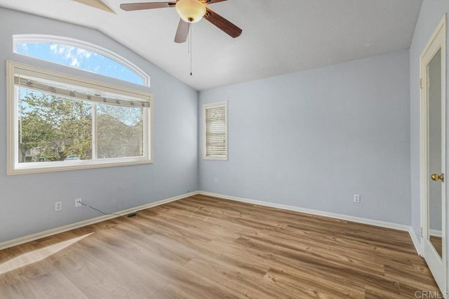 2550 Garnet Peak Rd, Chula Vista, CA 91915 - spare room featuring lofted ceiling, a ceiling fan, wood finished floors, and baseboards
