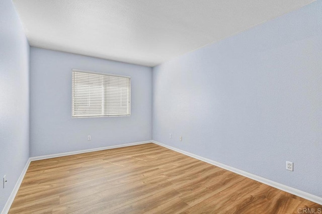2550 Garnet Peak Rd, Chula Vista, CA 91915 - unfurnished room with light wood-style floors and baseboards