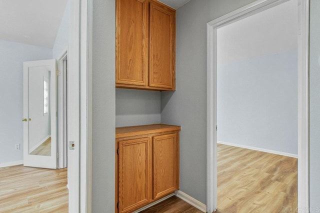 2550 Garnet Peak Rd, Chula Vista, CA 91915 - hall with light wood-style floors and baseboards