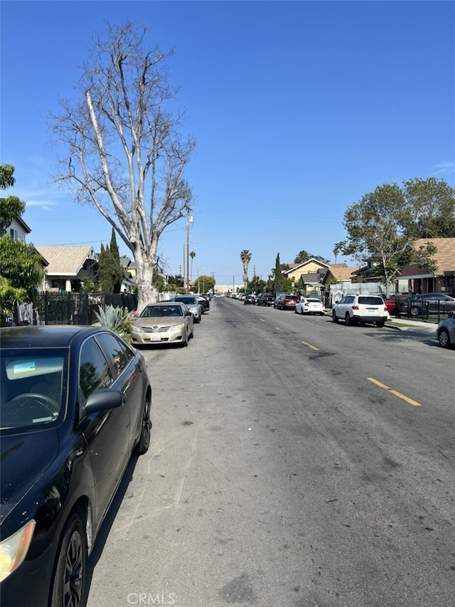 347 E 61st St, Los Angeles, CA 90003 - view of asphalt street featuring a residential view