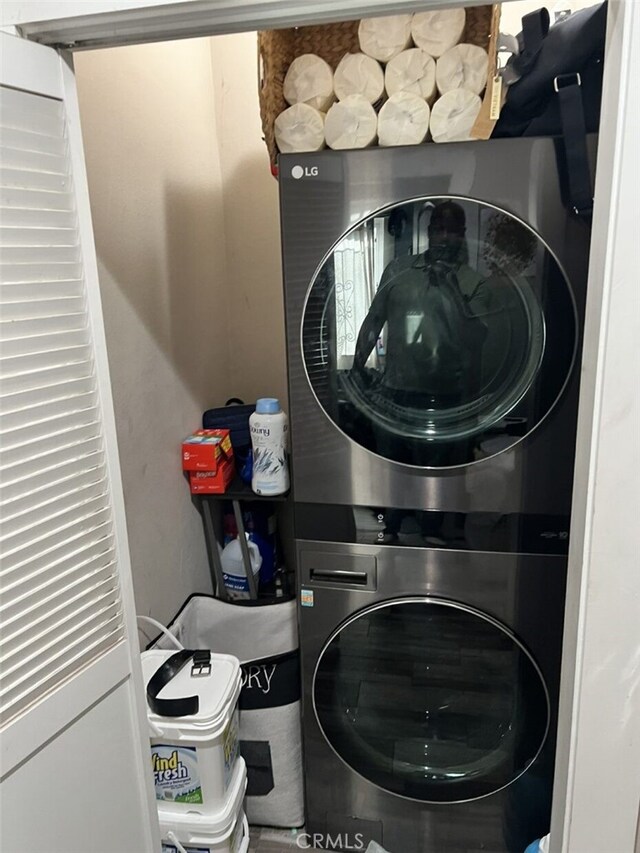 347 E 61st St, Los Angeles, CA 90003 - laundry room with stacked washing machine and dryer