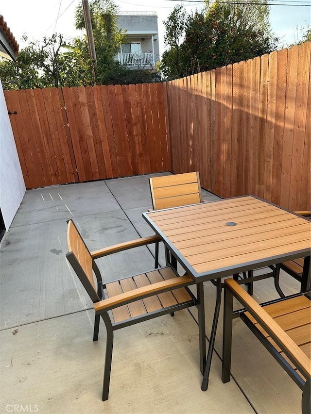 211 N Frederic St, Burbank, CA 91505 - view of patio featuring fence and outdoor dining space