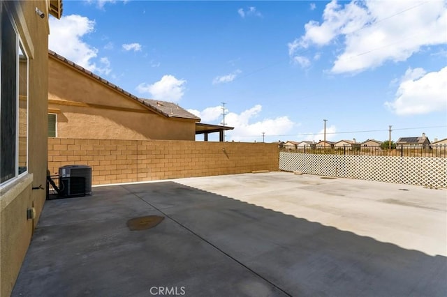15070 Paseo Verde Pl, Victorville, CA 92394 - view of patio / terrace with central AC