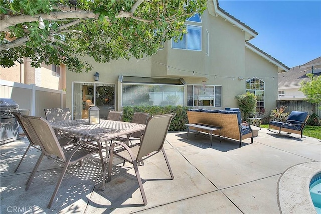 6730 Harrington Ct, Chino, CA 91710 - view of patio with fence, outdoor dining space, and an outdoor hangout area