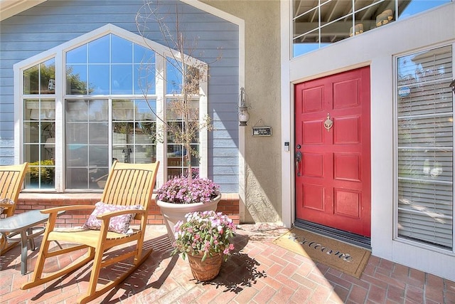 6730 Harrington Ct, Chino, CA 91710 - doorway to property featuring stucco siding and covered porch