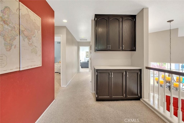 6730 Harrington Ct, Chino, CA 91710 - corridor with light colored carpet, plenty of natural light, baseboards, and recessed lighting