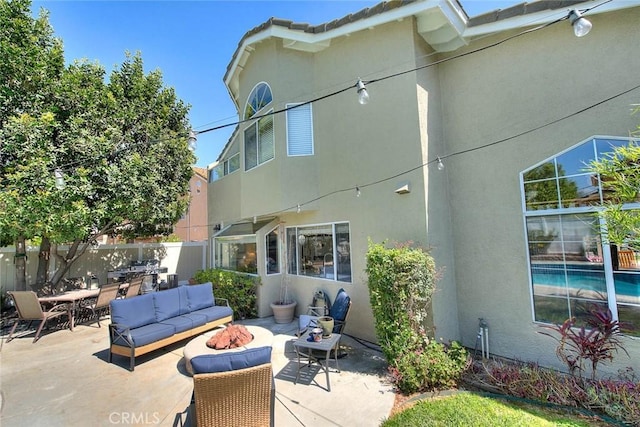 6730 Harrington Ct, Chino, CA 91710 - view of patio / terrace with an outdoor living space with a fire pit, fence, and outdoor dining space
