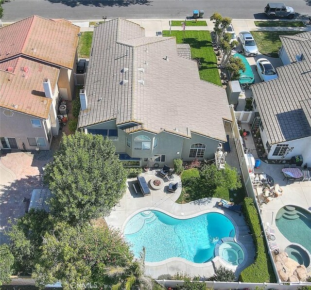 6730 Harrington Ct, Chino, CA 91710 - drone / aerial view of a pool