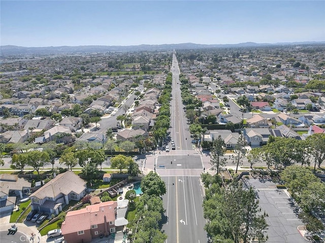 6730 Harrington Ct, Chino, CA 91710 - aerial overview of property's location with nearby suburban area and a mountain backdrop