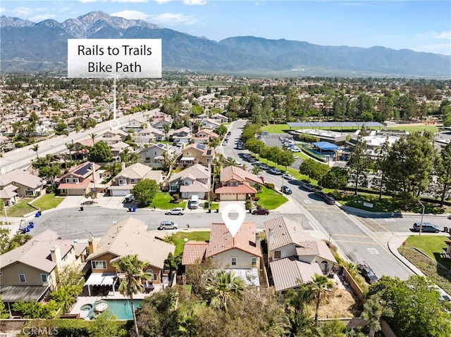 aerial perspective of suburban area featuring a mountain backdrop