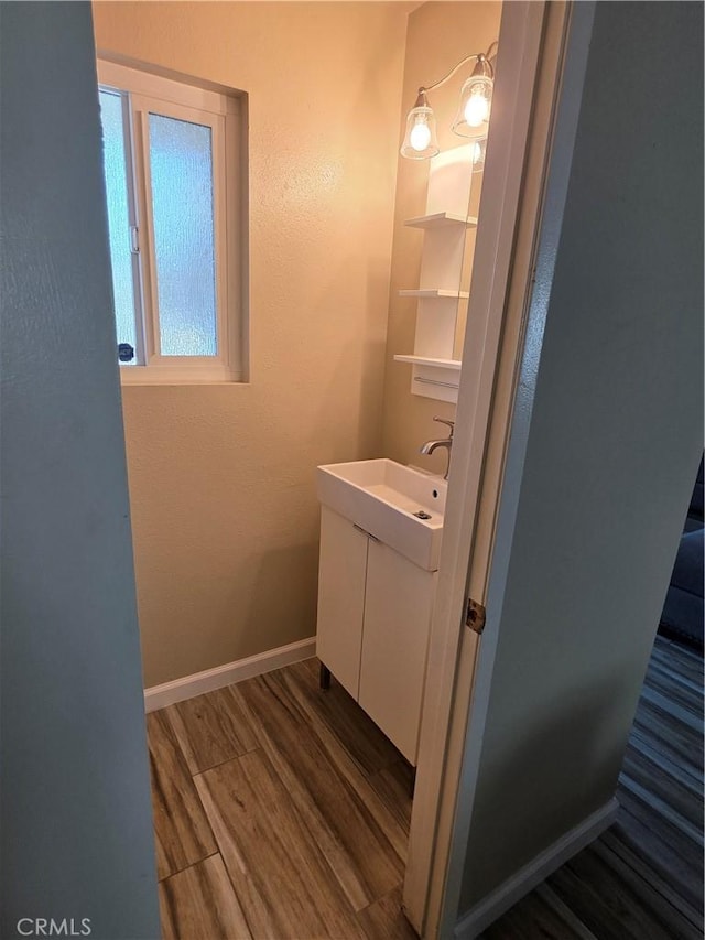 4676 Maxwell Ct, Riverside, CA 92501 - bathroom with vanity and wood finished floors
