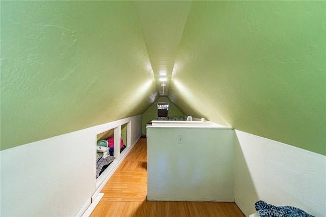 23120 Sycamore Ln, Crestline, CA 92325 - additional living space with vaulted ceiling and wood finished floors
