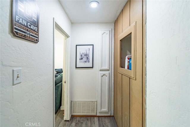 23120 Sycamore Ln, Crestline, CA 92325 - corridor featuring wood finished floors