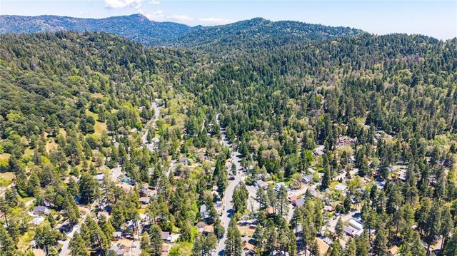 23120 Sycamore Ln, Crestline, CA 92325 - aerial view of property and surrounding area featuring a forest and a mountain backdrop