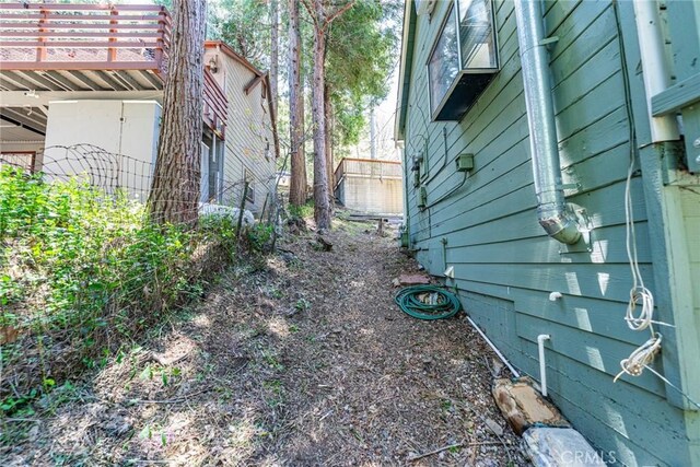 23120 Sycamore Ln, Crestline, CA 92325 - view of yard featuring a wooden deck