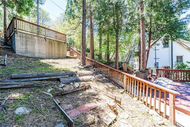 23120 Sycamore Ln, Crestline, CA 92325 - fenced yard featuring a deck