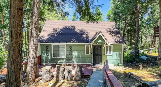 23120 Sycamore Ln, Crestline, CA 92325 - view of front facade with a shingled roof