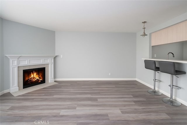 516 Venice Way, Inglewood, CA 90302 - unfurnished living room with a fireplace and wood finished floors