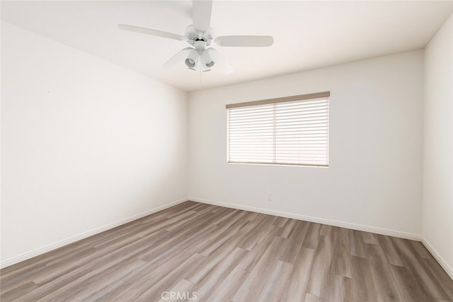 516 Venice Way, Inglewood, CA 90302 - empty room with light wood finished floors and a ceiling fan