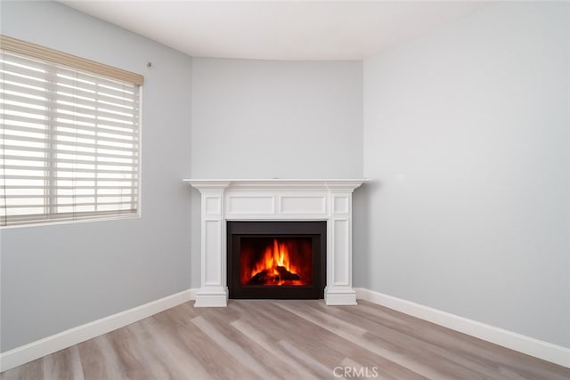 516 Venice Way, Inglewood, CA 90302 - detailed view of wood finished floors and a warm lit fireplace