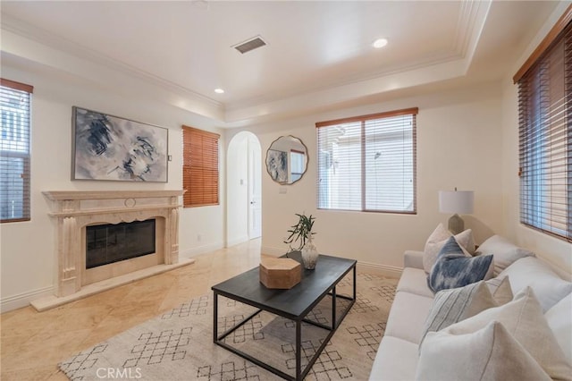 416 15th St, Huntington Beach, CA 92648 - living room with a raised ceiling, ornamental molding, arched walkways, recessed lighting, and a high end fireplace