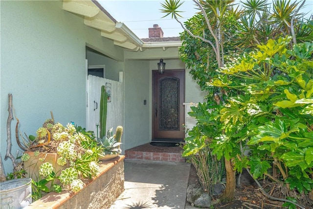 8922 Tracy Ave, Garden Grove, CA 92841 - entrance to property with stucco siding and a chimney
