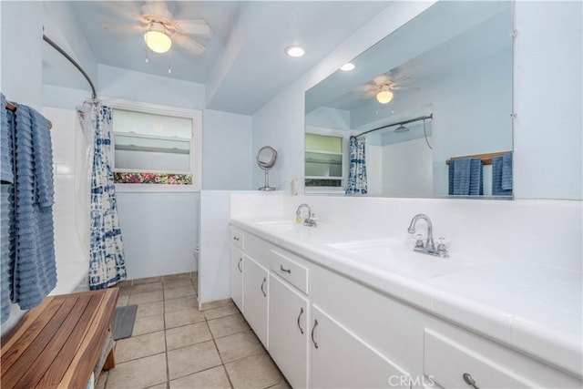 8922 Tracy Ave, Garden Grove, CA 92841 - bathroom featuring a ceiling fan, toilet, double vanity, recessed lighting, and tile patterned flooring