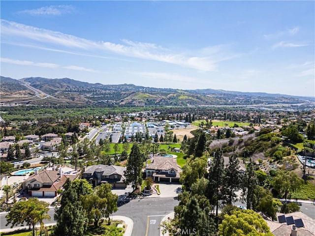aerial perspective of suburban area featuring mountains