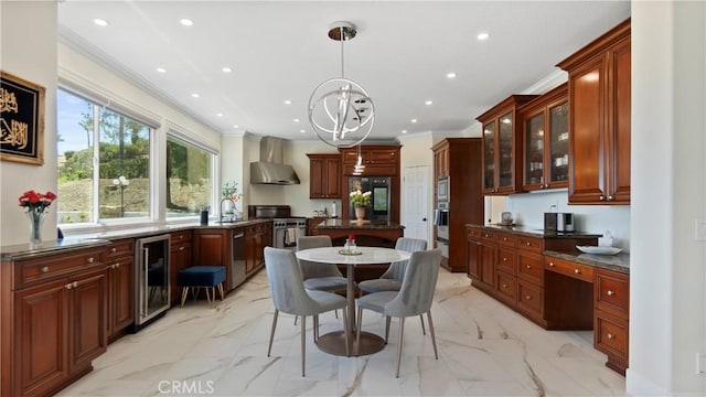 kitchen featuring wine cooler, wall chimney exhaust hood, dark countertops, light marble finish flooring, and crown molding