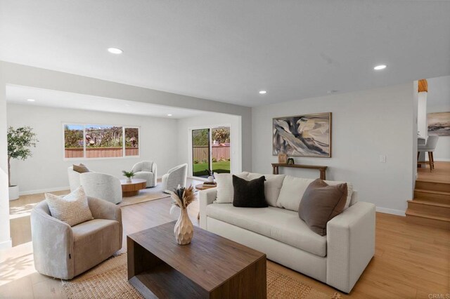 9142 Ellingham St, San Diego, CA 92129 - living room with light wood-style flooring, recessed lighting, and baseboards