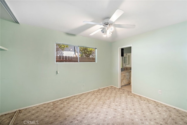 104 W Avenida Cadiz, San Clemente, CA 92672 - unfurnished bedroom featuring carpet flooring, baseboards, ensuite bathroom, and a ceiling fan