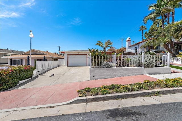 104 W Avenida Cadiz, San Clemente, CA 92672 - view of front facade featuring concrete driveway, fence, and a garage