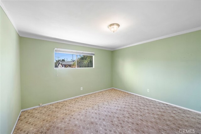104 W Avenida Cadiz, San Clemente, CA 92672 - carpeted empty room featuring crown molding and baseboards