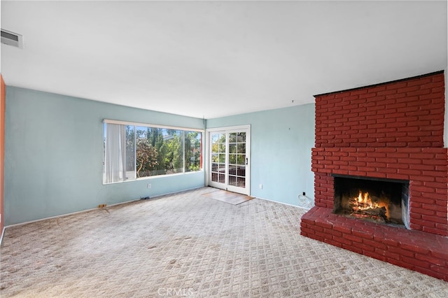 104 W Avenida Cadiz, San Clemente, CA 92672 - unfurnished living room featuring carpet floors, a brick fireplace, and baseboards